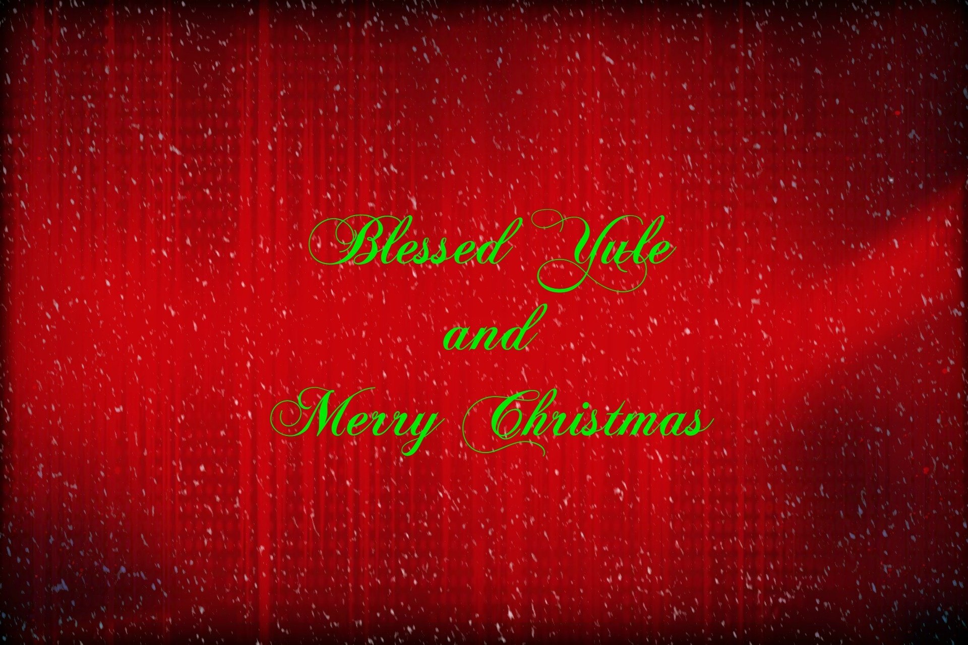 HD PC desktop wallpaper: red textured background with falling snow and green script reading Blessed Yule and Merry Christmas — holiday Merry Christmas greeting.
