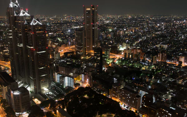 A vibrant night view of Tokyo, Japan's sprawling cityscape illuminated by countless lights, captured in stunning 4K Ultra HD detail.