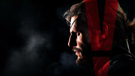 A striking HD desktop wallpaper featuring a side profile of a character from Metal Gear Solid V: The Phantom Pain, with a dramatic red overlay against a dark background.
