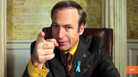 HD wallpaper featuring Saul Goodman from Breaking Bad, portrayed by Bob Odenkirk, pointing at the viewer with a confident expression.