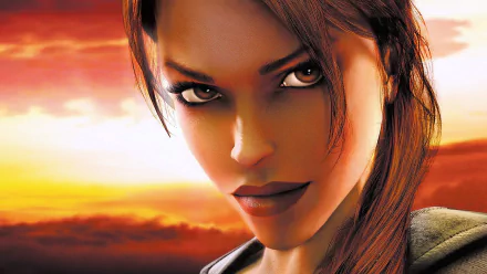 Close-up of Lara Croft from the video game Tomb Raider: Legend, set against a vibrant orange sunset, designed as an HD PC desktop wallpaper and background.