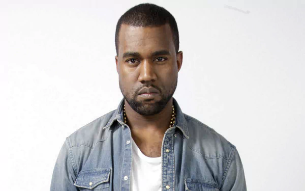 HD wallpaper featuring a person in a denim jacket posing against a plain background.