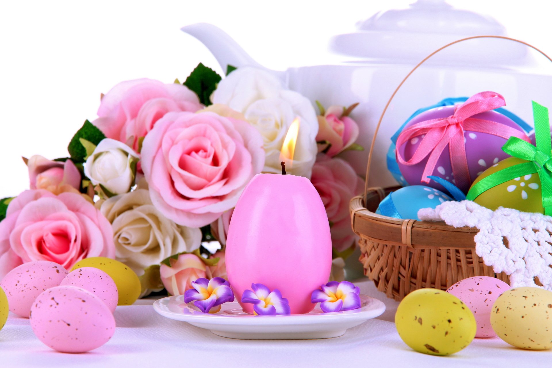 4K Ultra HD Easter holiday wallpaper featuring pink and white roses, a lit pink candle, colorful speckled eggs, and a basket filled with decorated Easter eggs.