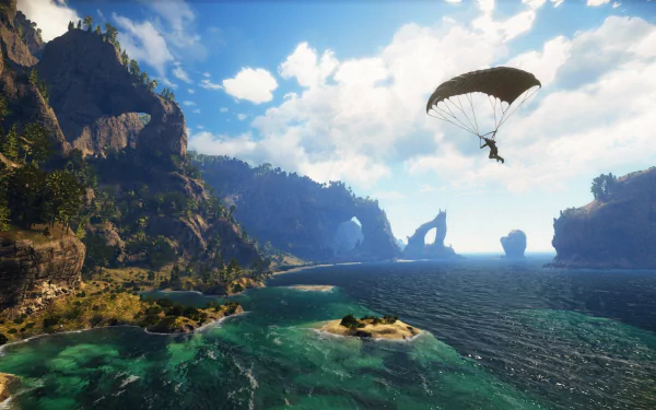 HD PC desktop wallpaper featuring Rico Rodriguez from the video game Just Cause 3 parachuting over a scenic coastal landscape with cliffs and blue skies.