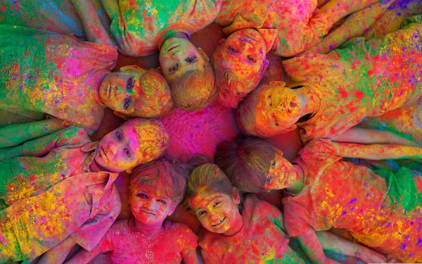 A vibrant, psychedelic image of children joyfully celebrating Holi, surrounded by a burst of colorful powders, creating a festive and lively atmosphere.