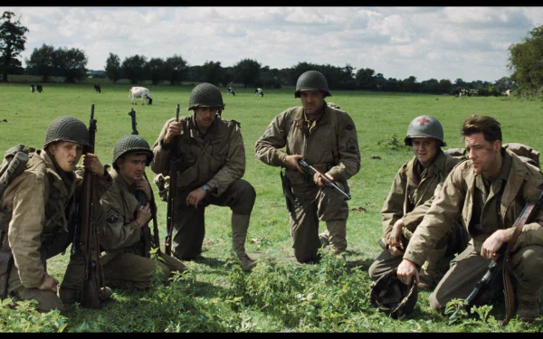 A dramatic scene from Saving Private Ryan, featuring soldiers in military gear, set against a lush green field, serves as a striking HD desktop wallpaper.