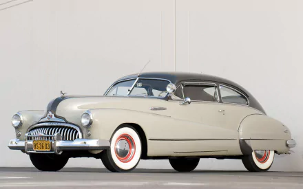 HD PC desktop wallpaper background featuring a classic Buick Roadmaster vehicle — light gray 1948 coupe with chrome trim and whitewall tires on a neutral backdrop.