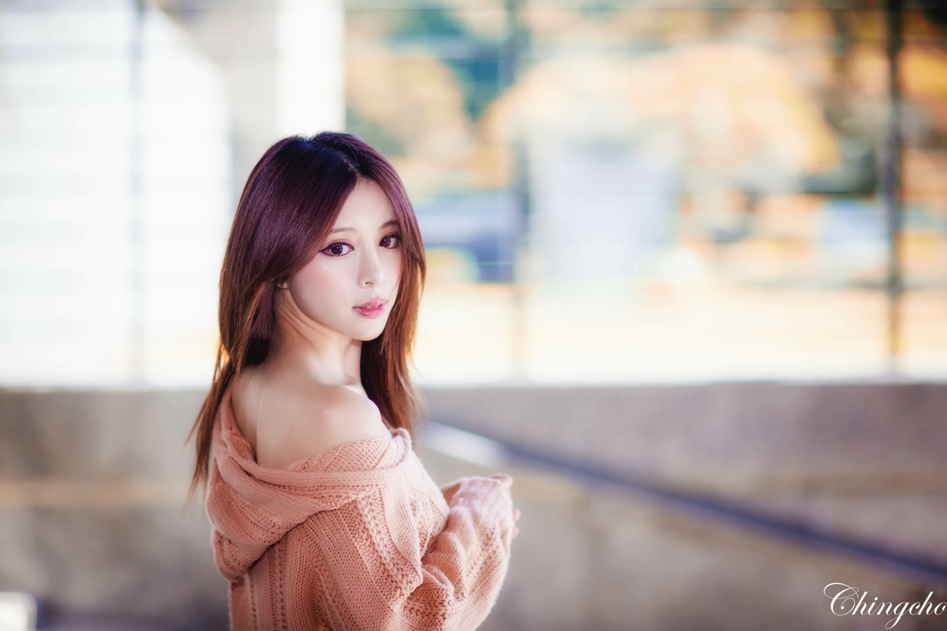 Portrait of a Taiwanese woman with soft bokeh background, captured in 4K Ultra HD, featuring Julie Chang (Zhang Qi Jun) with a calm expression.