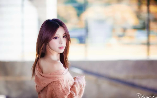 Portrait of a Taiwanese woman with soft bokeh background, captured in 4K Ultra HD, featuring Julie Chang (Zhang Qi Jun) with a calm expression.