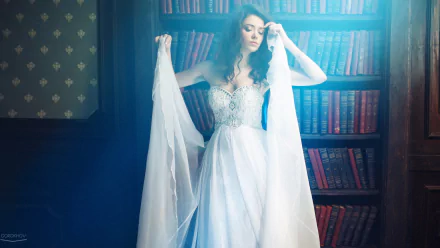 A bride in an elegant wedding dress poses gracefully in a library setting, captured as an HD PC desktop wallpaper background.
