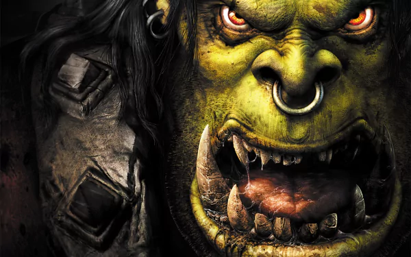 A fierce green orc with piercing orange eyes and sharp teeth, showcasing powerful detail, serves as an engaging HD wallpaper for fans of the video game World of Warcraft.