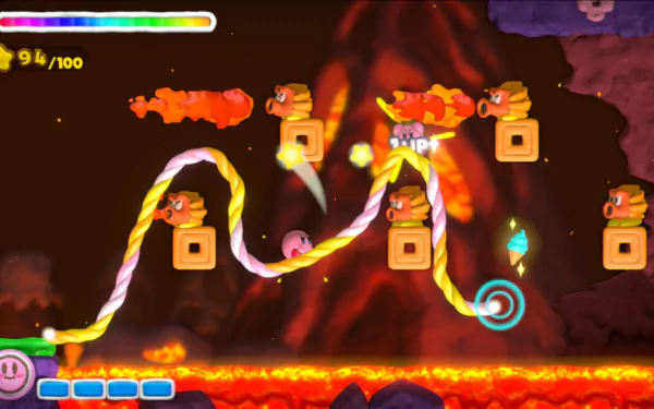 HD desktop wallpaper from Kirby and the Rainbow Curse, featuring Kirby in an action-packed lava level scene.