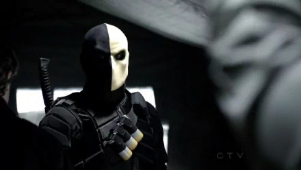 HD desktop wallpaper featuring Deathstroke from the TV show Arrow, showcasing the iconic character in a striking pose with a dark, atmospheric backdrop.