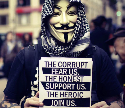 An image of a person wearing a Guy Fawkes mask and a scarf, holding a sign that reads The corrupt fear us. The honest support us. The heroic join us. HD wallpaper tagged with technology, anonymous.