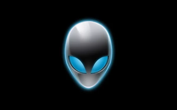 HD desktop wallpaper featuring the iconic Alienware logo, a silver alien face with glowing blue eyes, set against a black background. Tags: technology, Alienware.
