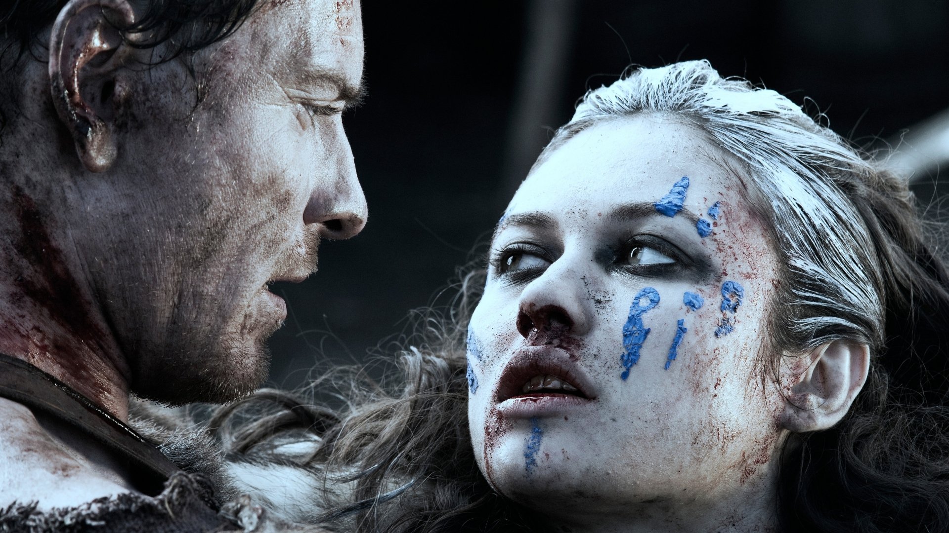 Close-up of two intense characters from the movie Centurion, captured in a detailed 4K Ultra HD PC desktop wallpaper.