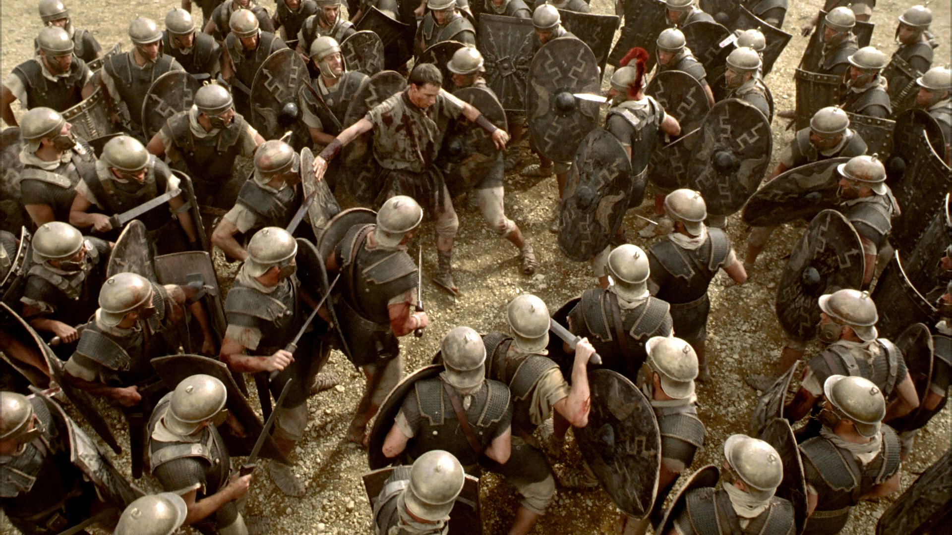 HD PC desktop wallpaper from the TV show Rome depicting a fierce battle scene with Roman soldiers engaged in close combat.