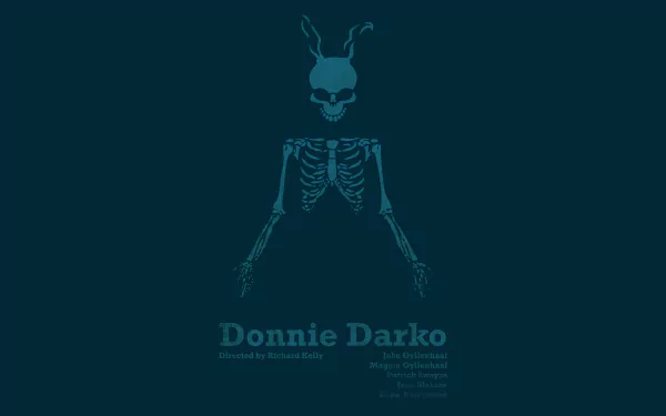 HD desktop wallpaper of the movie Donnie Darko, featuring a skeletal figure with rabbit ears and the movie title beneath it on a dark background.