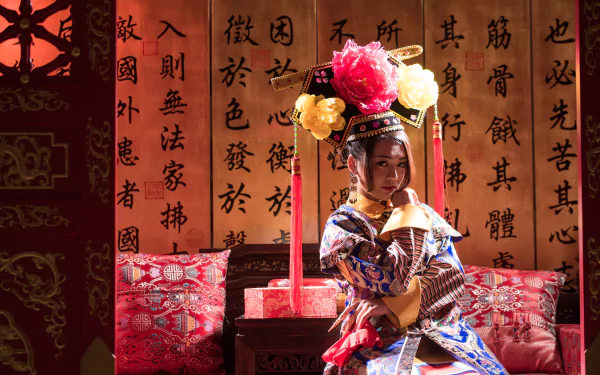 A woman dressed in traditional Taiwanese Chinese costume, Qián Fūrén style, poses gracefully on a sofa against a backdrop of calligraphy, captured in 4K Ultra HD.
