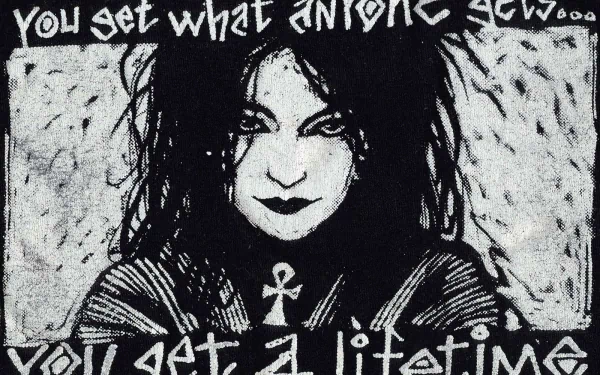 Gothic comic-style HD desktop wallpaper featuring a dark-haired character from The Sandman, framed by bold text in a moody, monochrome design.