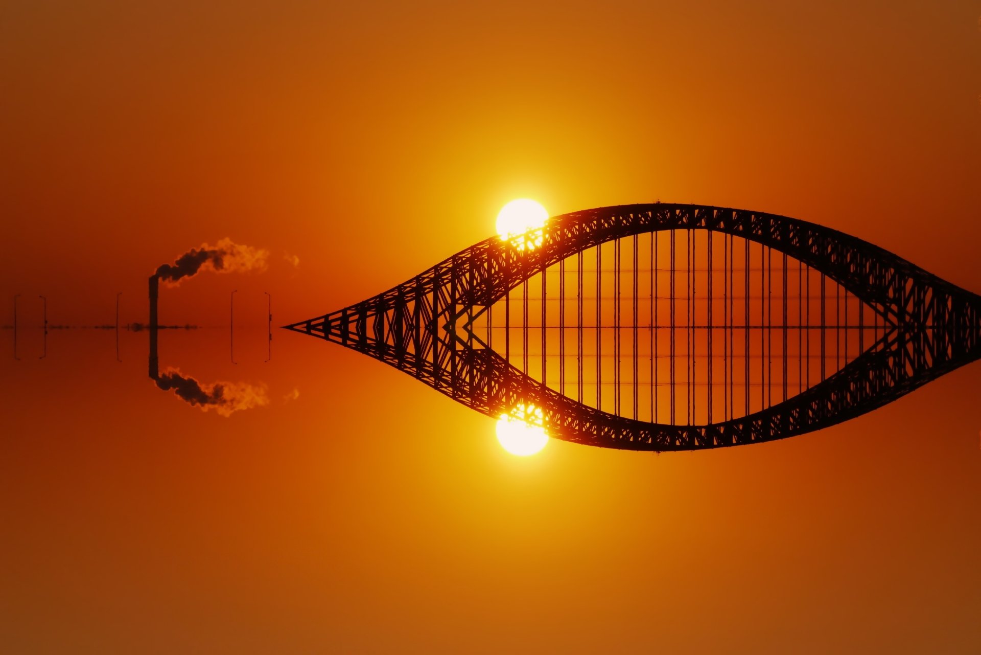 4K Ultra HD PC desktop wallpaper: symmetrical bridge silhouette reflected on calm water under a vivid orange sunset, creating twin sun reflections — landscape nature photography.
