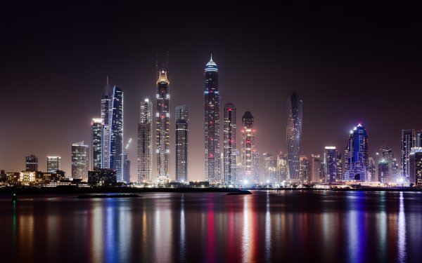 Man Made Dubai Cities United Arab Emirates City Skyscraper Reflection Water Cityscape Night HD Wallpaper | Background Image