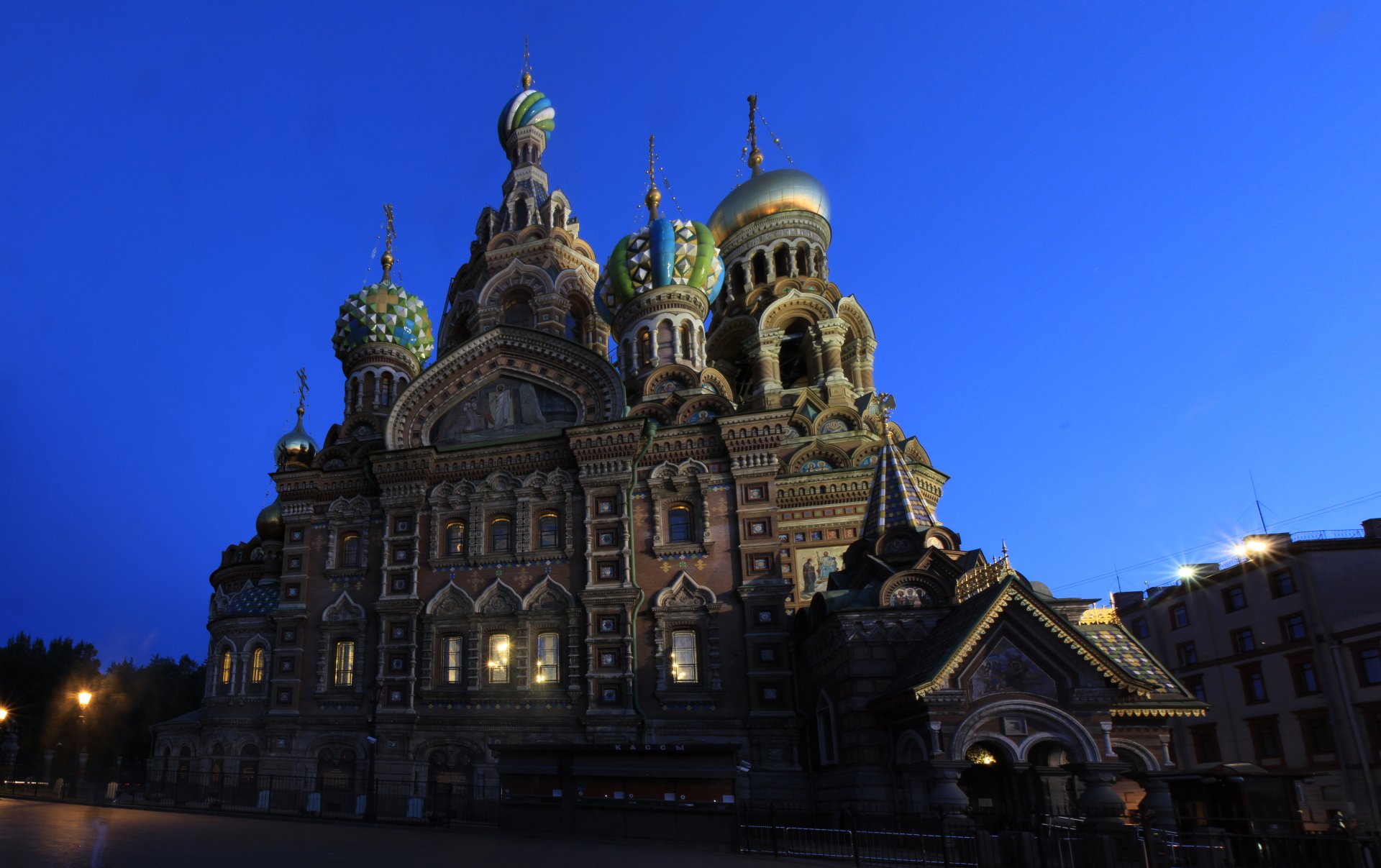 Night view of the Church of the Savior on Blood in Saint Petersburg, Russia, showcasing its intricate cathedral architecture and domes in stunning 8K Ultra HD quality.