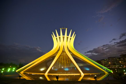 Cathedral of Brasília at night, illuminated modern hyperboloid concrete and glass structure in Brasília, Brazil — 5K Ultra HD PC desktop wallpaper and background.