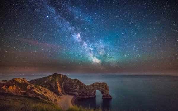 Milky Way night sea shore limestone cliff England dorset nature durdle door HD Desktop Wallpaper | Background Image