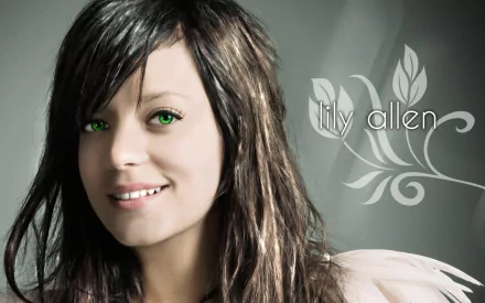 HD music desktop wallpaper: smiling woman with green eyes and long hair, floral swirls and stylized text lily allen.