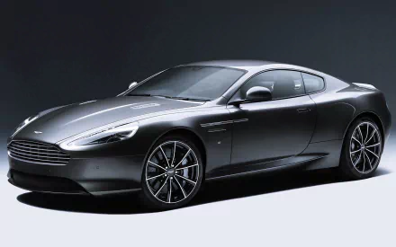 Silver Aston Martin DB9 sports car showcased as a sleek 4K Ultra HD PC desktop wallpaper and background.