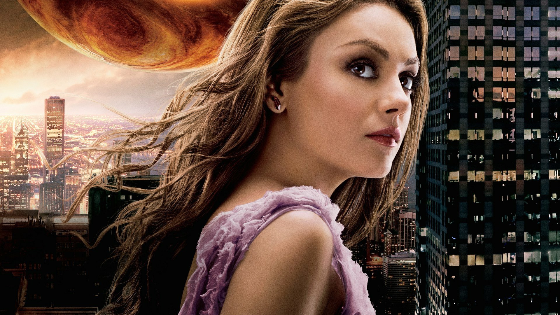 HD PC desktop wallpaper featuring Mila Kunis from the movie Jupiter Ascending against a cityscape and a fiery planet backdrop.