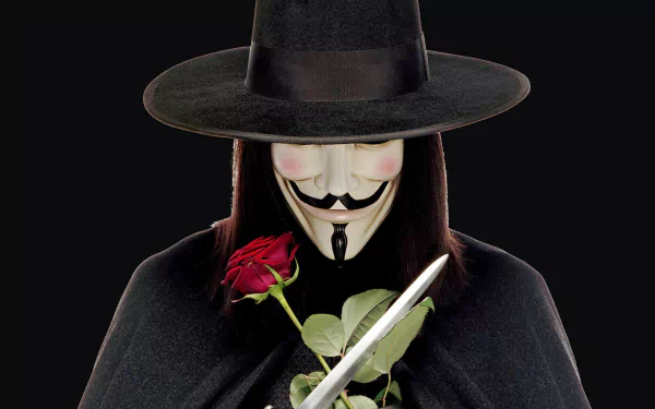 HD PC desktop wallpaper featuring the iconic masked character from the movie V for Vendetta holding a red rose and a dagger against a dark background.