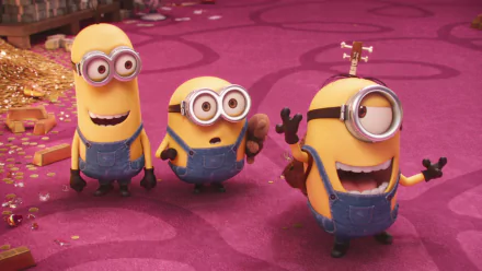 HD desktop wallpaper featuring Kevin, Stuart, and Bob from the Minions movie on a pink carpet background, showcasing their cute and playful expressions.