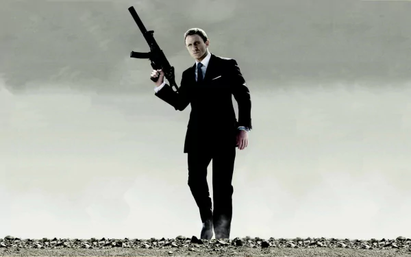 HD desktop wallpaper featuring Daniel Craig as James Bond holding a gun, from the movie Quantum of Solace, set against a dramatic gray sky background.