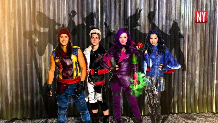 HD desktop wallpaper featuring characters from the movie Descendants standing in front of a gray metallic background.
