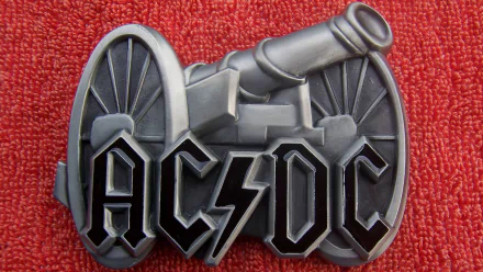 AC/DC logo featuring a cannon against a textured red background, serving as a striking music-themed HD PC desktop wallpaper and background.