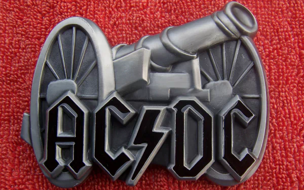 AC/DC logo featuring a cannon against a textured red background, serving as a striking music-themed HD PC desktop wallpaper and background.
