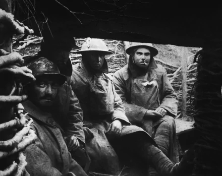 Black and white World War I photo of soldiers in a trench, captured with detailed military gear, presented as an HD PC desktop wallpaper and background.
