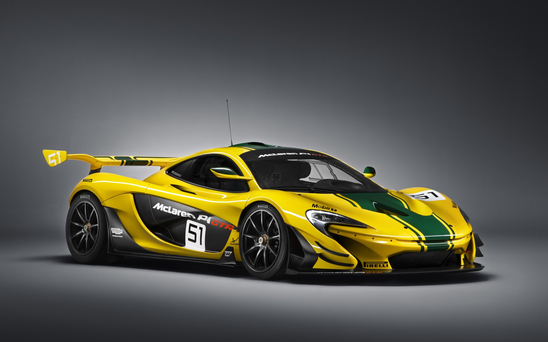 Dynamic McLaren P1 GTR: A Stunning Yellow Supercar HD Wallpaper