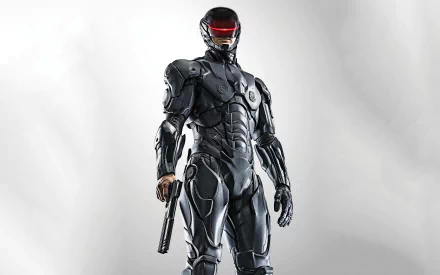RoboCop from the 2014 movie stands confidently in a sleek, high-tech suit, holding a gun, set against a light gray background. An impactful HD desktop wallpaper.