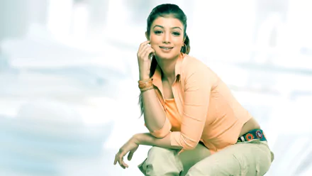 HD PC desktop wallpaper featuring a woman, Ayesha Takia, smiling and posing against a soft, light background.