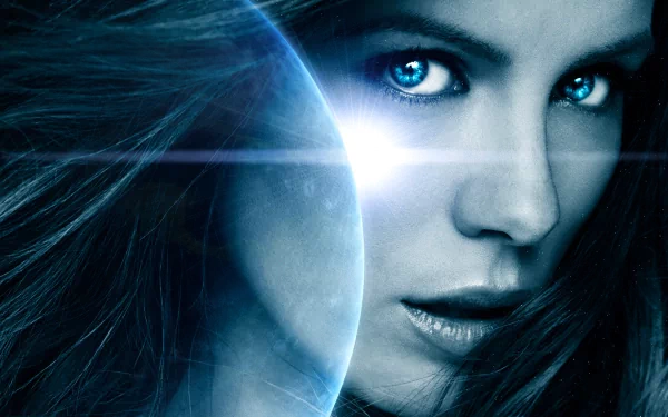 HD desktop wallpaper featuring Celebrity Kate Beckinsale with a cosmic blue glow and bright light effect.