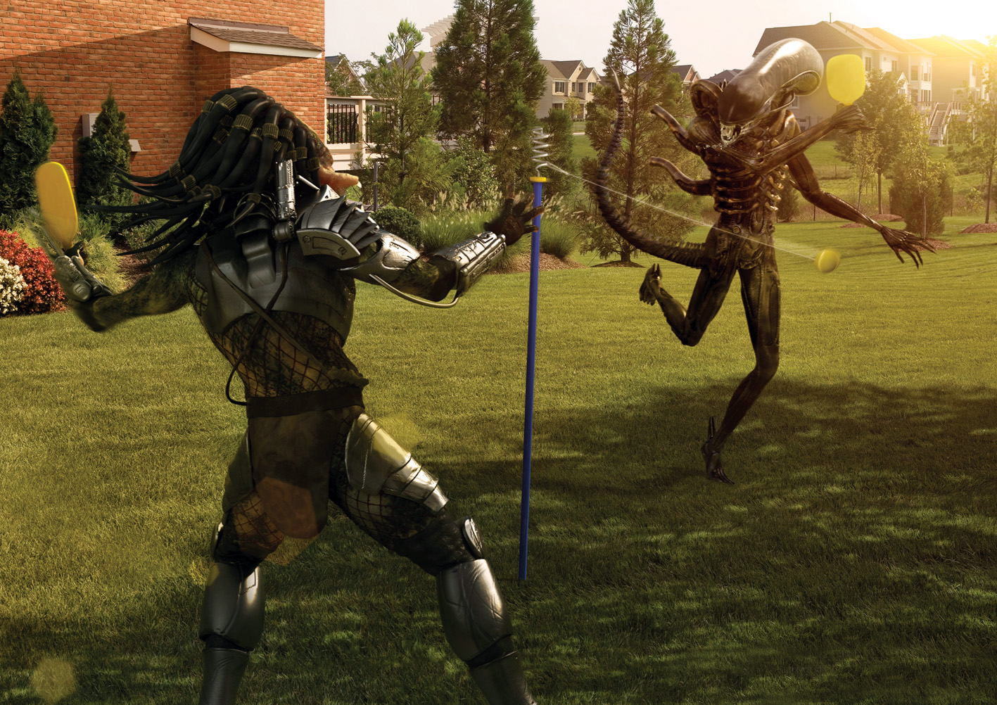 Alien vs. Predator playing tetherball.