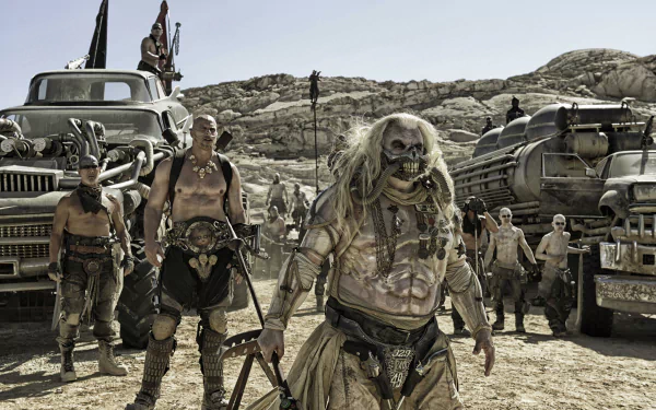 4K Ultra HD wallpaper featuring Rictus Erectus, Immortan Joe, and other characters from Mad Max: Fury Road, including actor Nathan Jones and Hugh Keays-Byrne, in a desert scene.