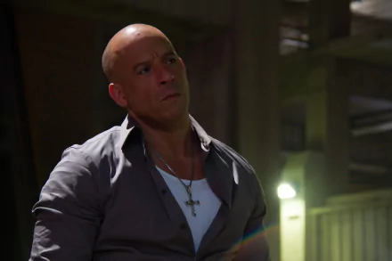Dominic Toretto, played by Vin Diesel, commands attention in this HD wallpaper from Furious 7, showcasing the intense vibe of the iconic movie character.