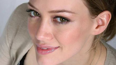 Close-up celebrity portrait of a smiling young woman with green eyes, glossy lips and a neutral top — HD PC desktop wallpaper/background.