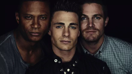 David Ramsey and Stephen Amell pose together in a dramatic portrait for the TV show Arrow. This HD wallpaper captures the intensity of their characters.