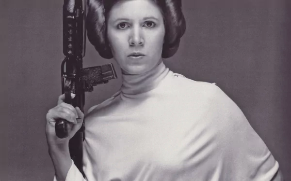 Carrie Fisher as Princess Leia Organa, wielding a blaster in a striking pose. This HD wallpaper captures the iconic character from the Star Wars movie franchise.