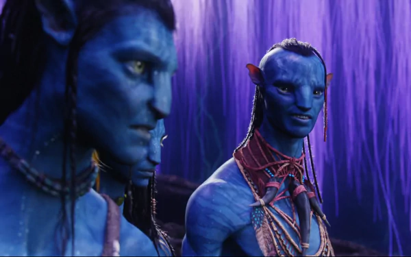 A vivid HD wallpaper featuring characters from the movie Avatar, showcasing the unique blue-skinned Na'vi in a mystical setting with purple foliage in the background.